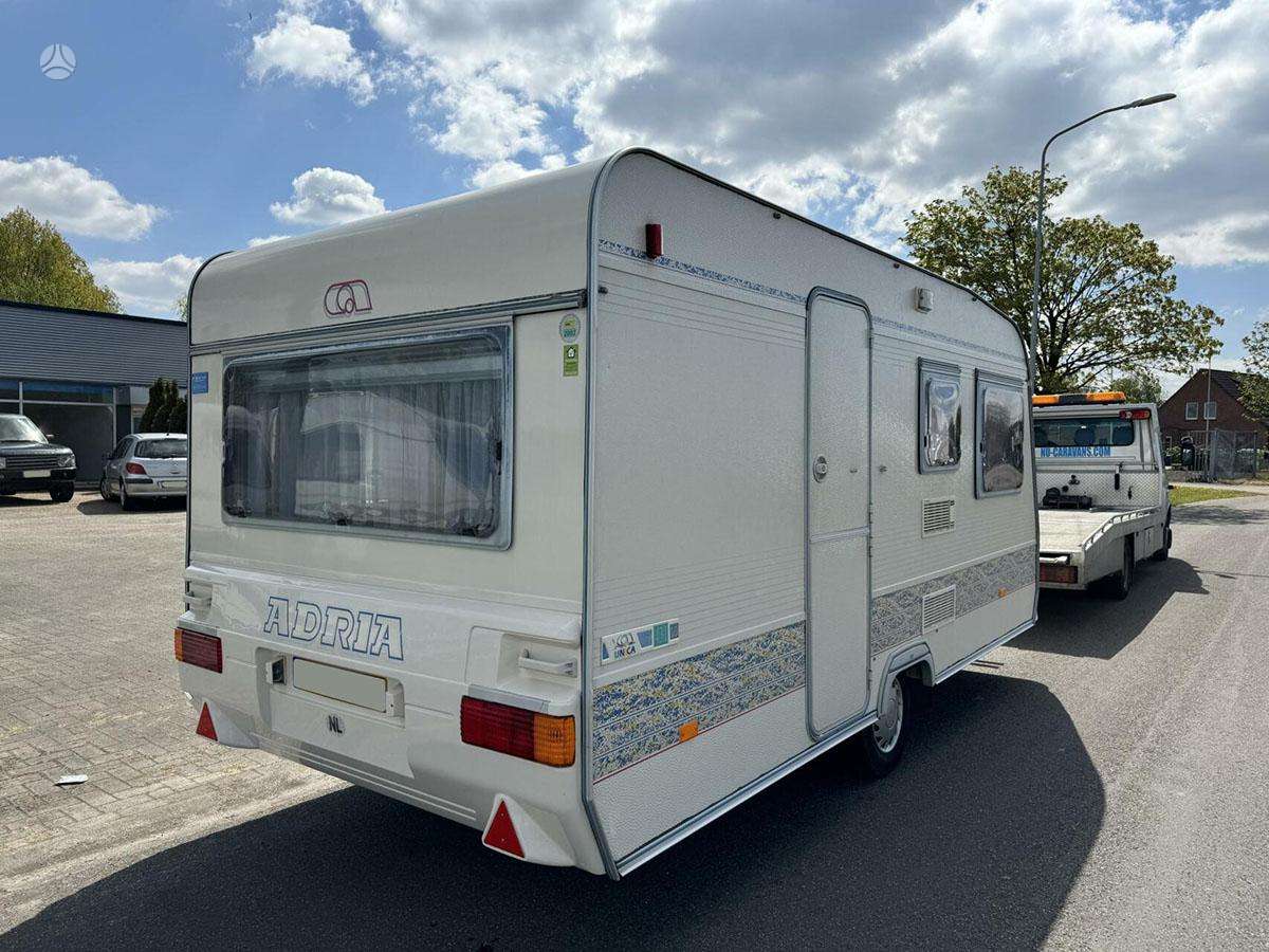 Adria Unica/Knaus, кемперы
