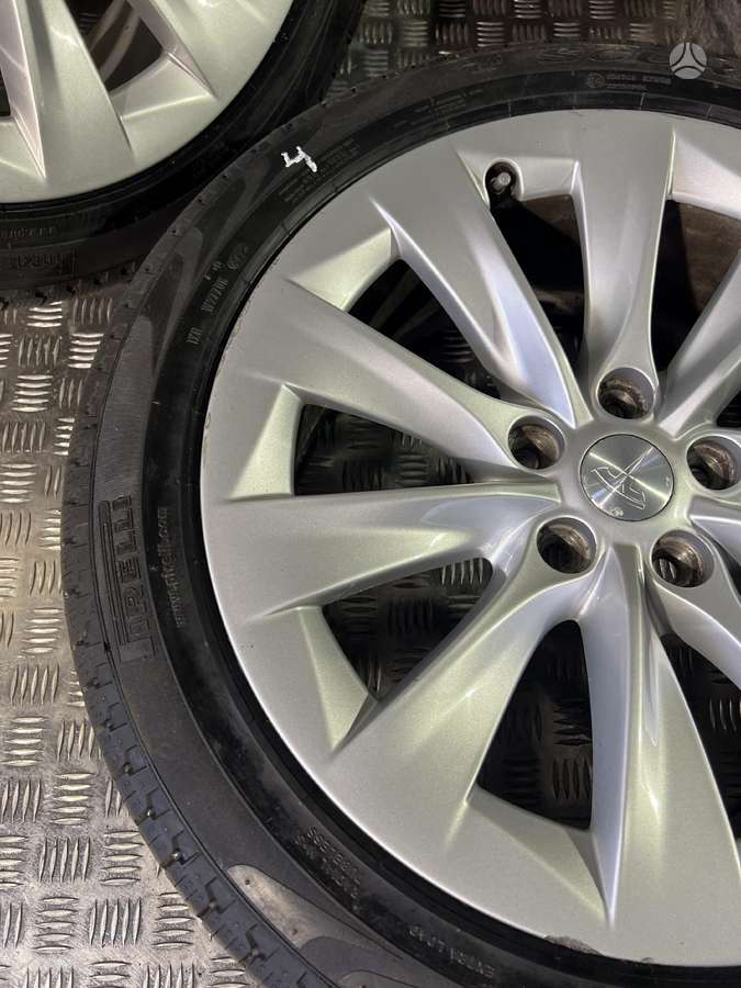 TESLA, vieglmetāla, R19