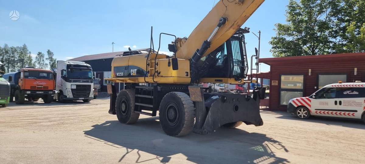 Caterpillar M 325D LMH, экскаваторы