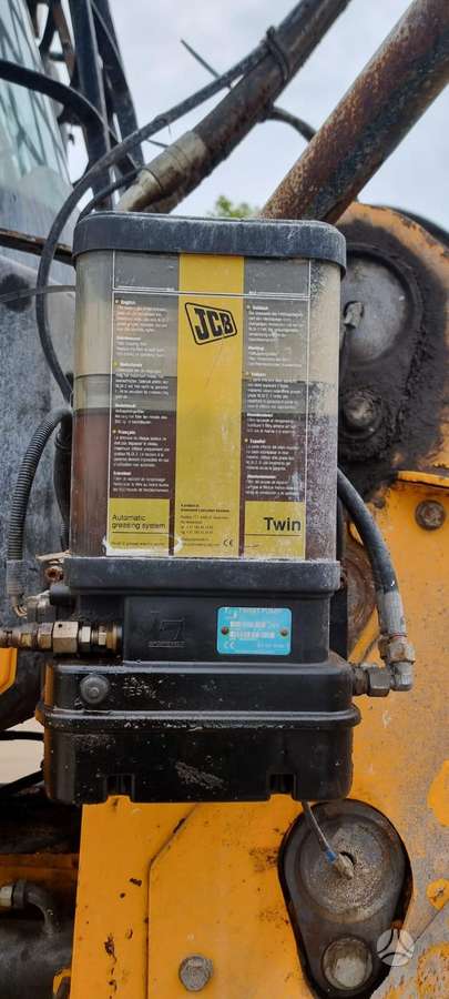 Caterpillar 457HT (T4F), frontal loader