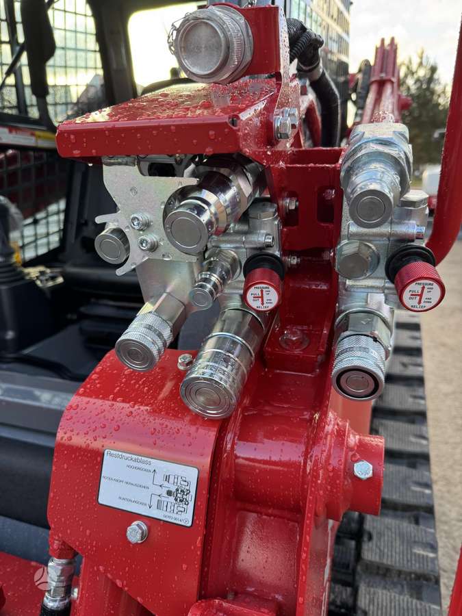 Takeuchi TL 10 V2, мини-погрузчики