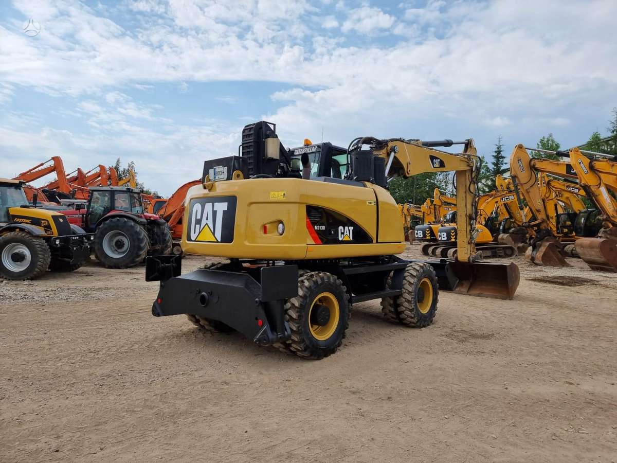 Caterpillar M313 D, экскаваторы