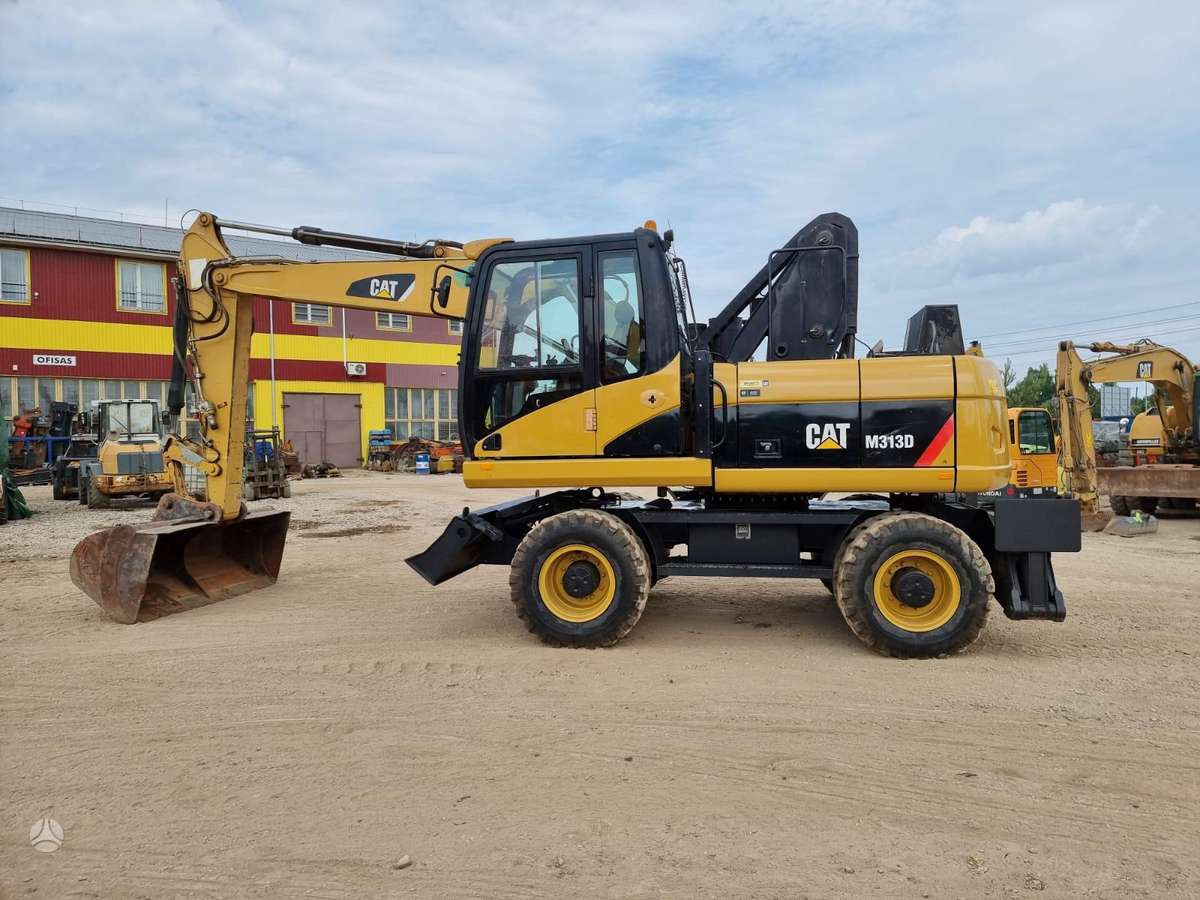 Caterpillar M313 D, экскаваторы