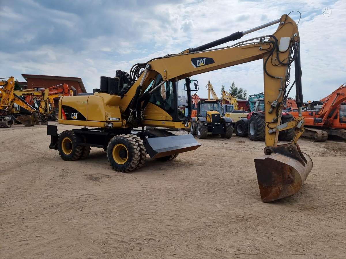 Caterpillar M313 D, ekskavatoriai