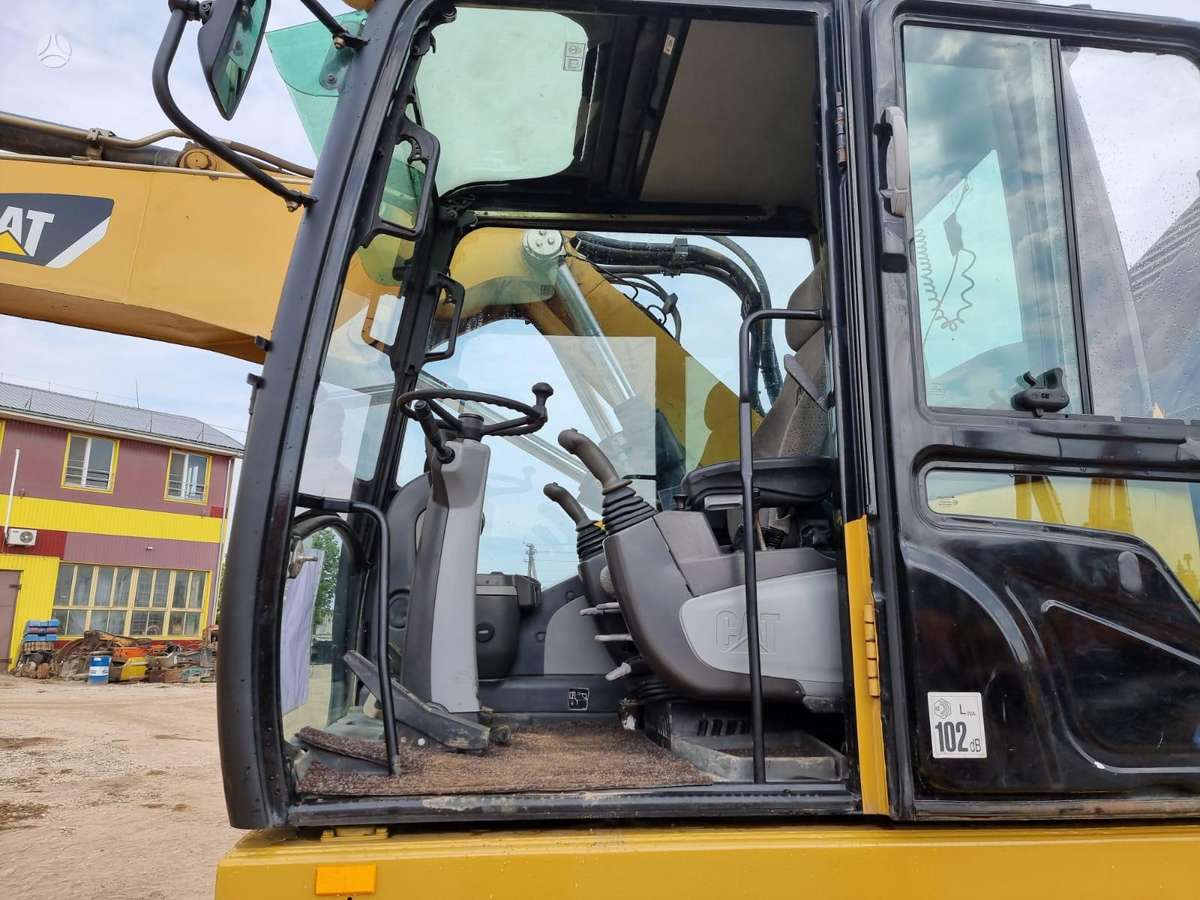 Caterpillar M313 D, экскаваторы