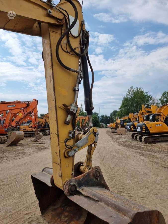 Caterpillar M313 D, экскаваторы