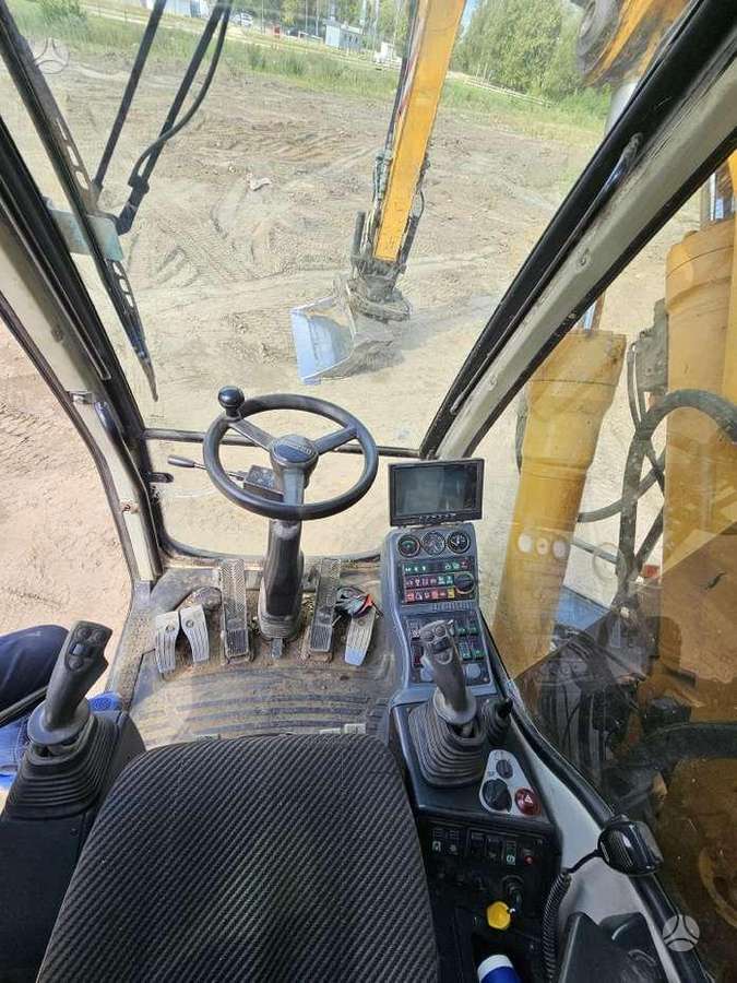 Liebherr A316 Litronic, экскаваторы