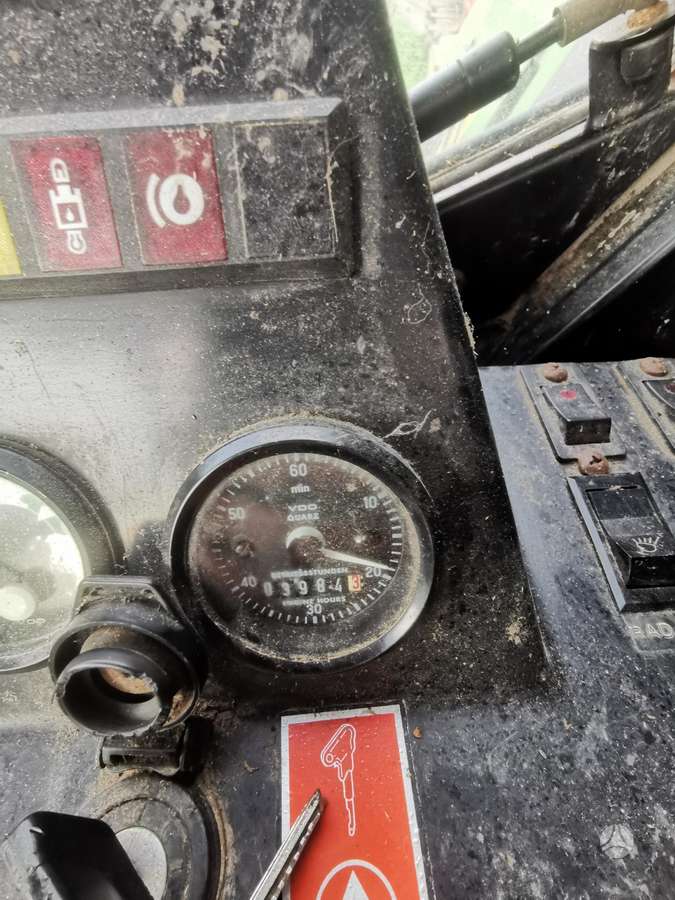 John Deere 1075, kombaini