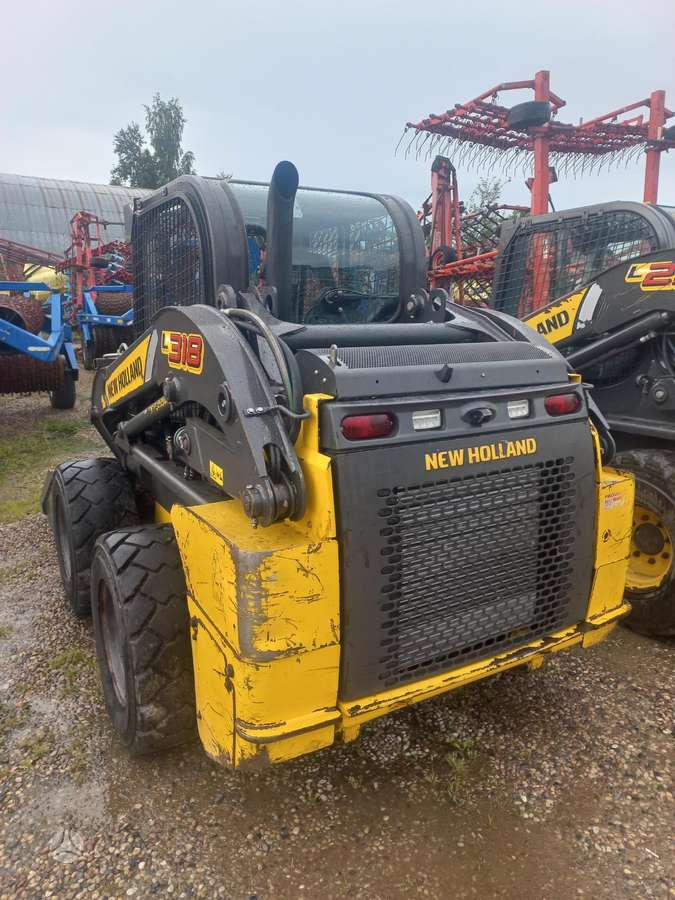 New Holland L318, мини-погрузчики
