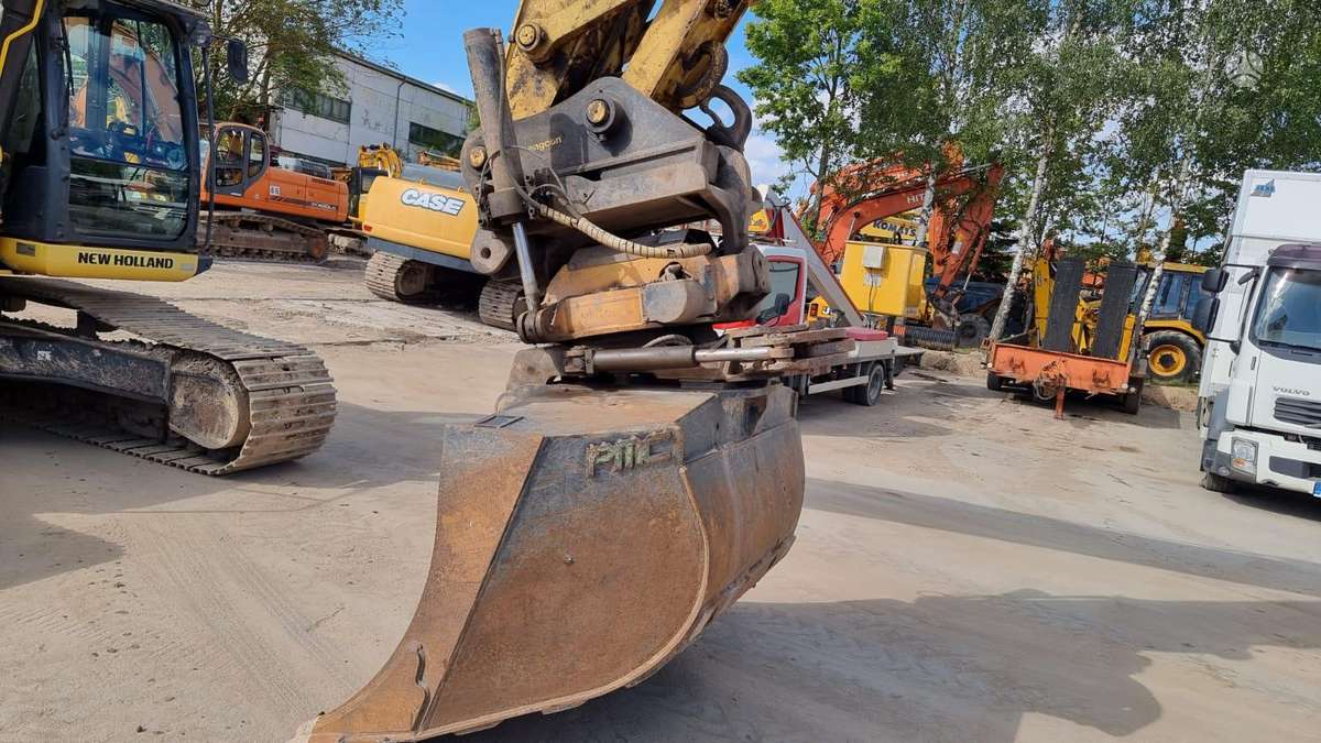 New Holland E 265 C Rototilt, ekskavatoriai
