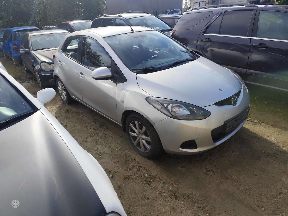 Mazda 2 по частям