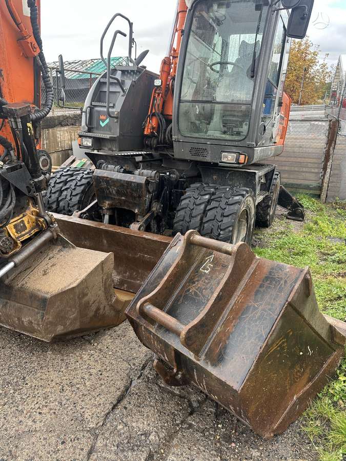 Hitachi ZX140W-3 su rotoriumi, экскаваторы