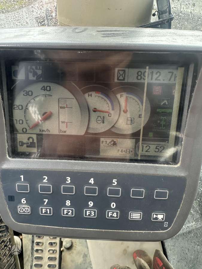Hitachi ZX140W-3 su rotoriumi, экскаваторы