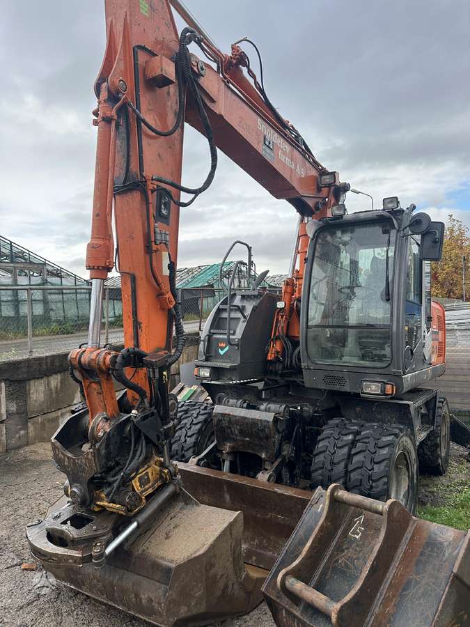 Hitachi ZX140W-3 su rotoriumi, экскаваторы
