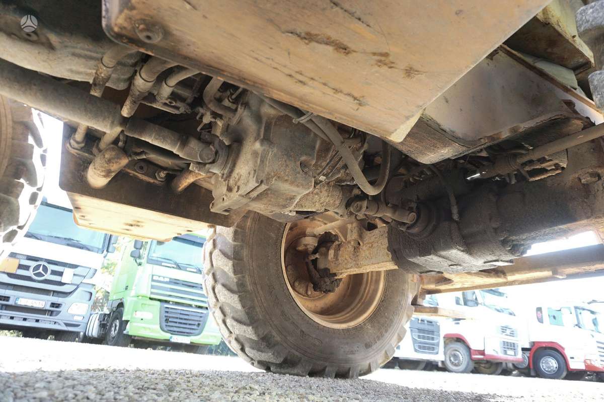 Case 695ST, экскаваторные погрузчики