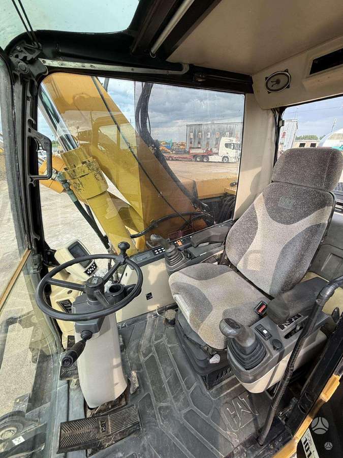Caterpillar M315C, ekskavatoriai