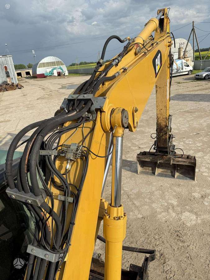 Caterpillar M315C, экскаваторы