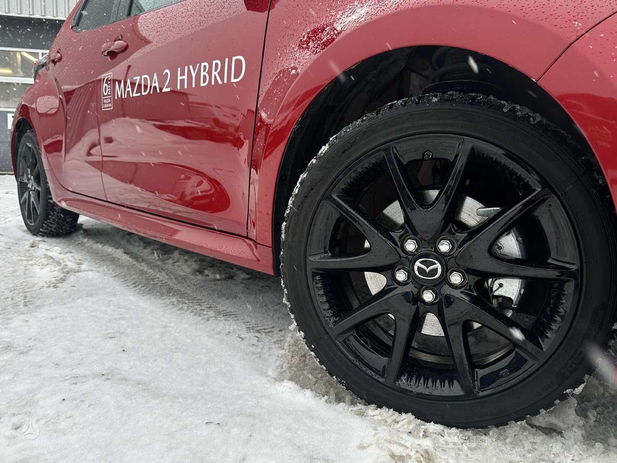 Mazda 2, 1.5 l., off-road / crossover