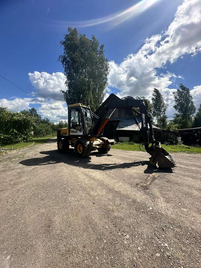 Mecalac MXT, excavator loader