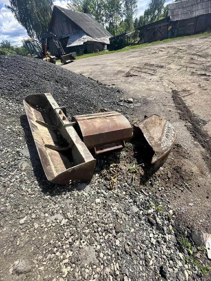 Mecalac MXT, excavator loader
