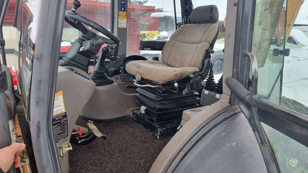 Case 695 SR2-4PS, excavator loader