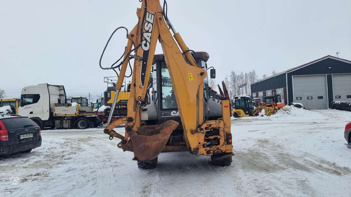 Case 695 SR2-4PS, excavator loader