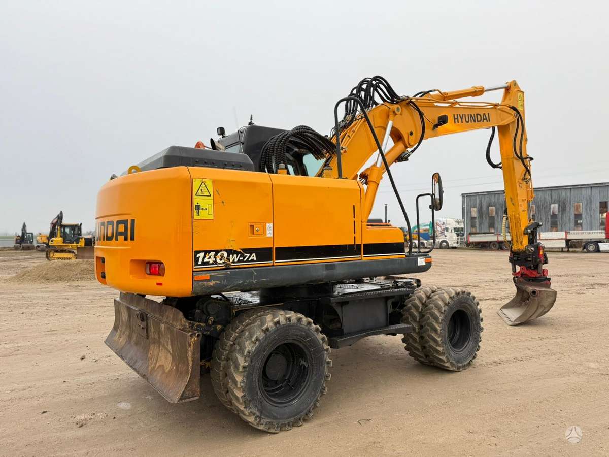 Hyundai Robex 140 W-7A ROTOTILT, экскаваторы