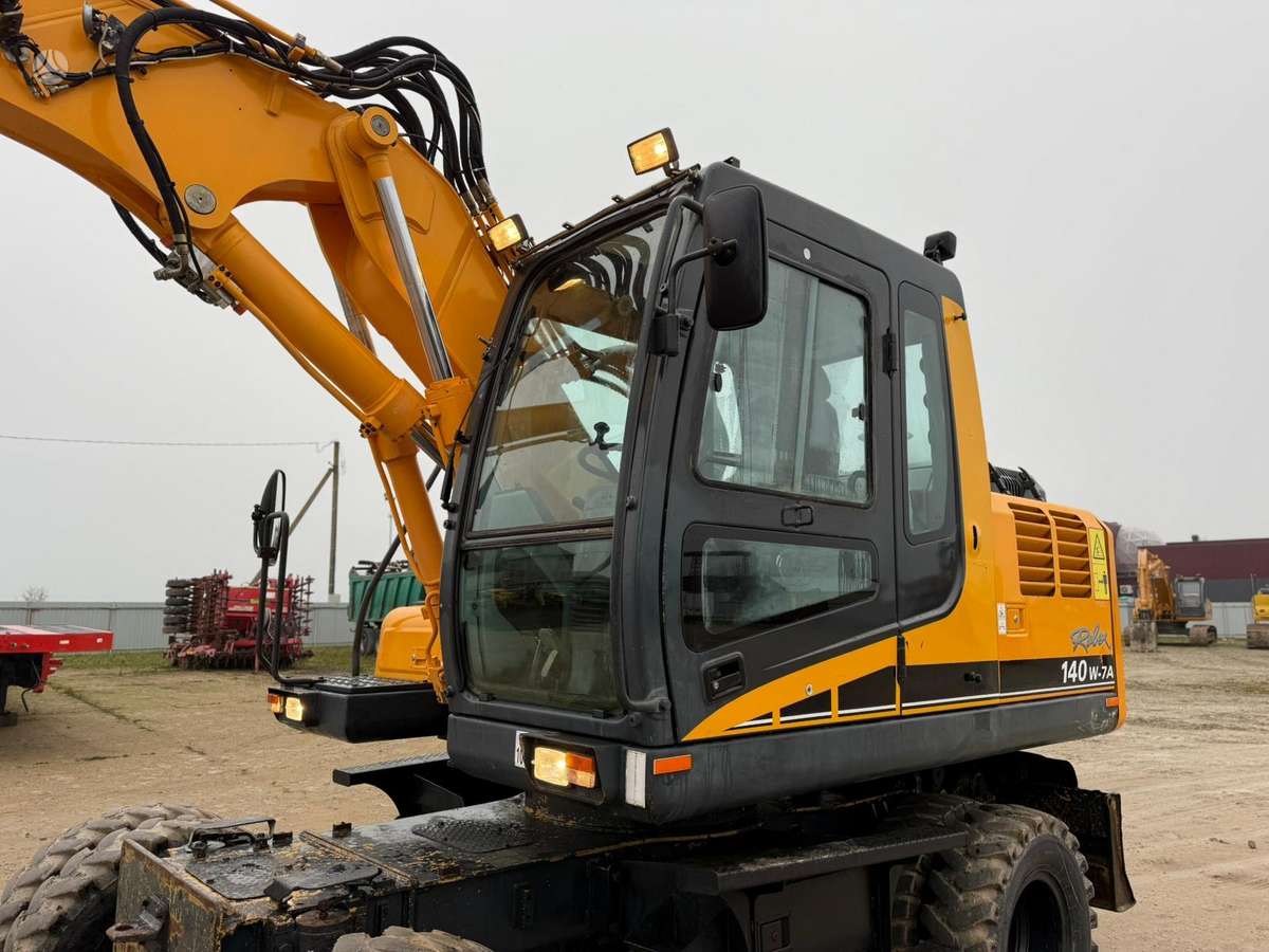Hyundai Robex 140 W-7A ROTOTILT, экскаваторы