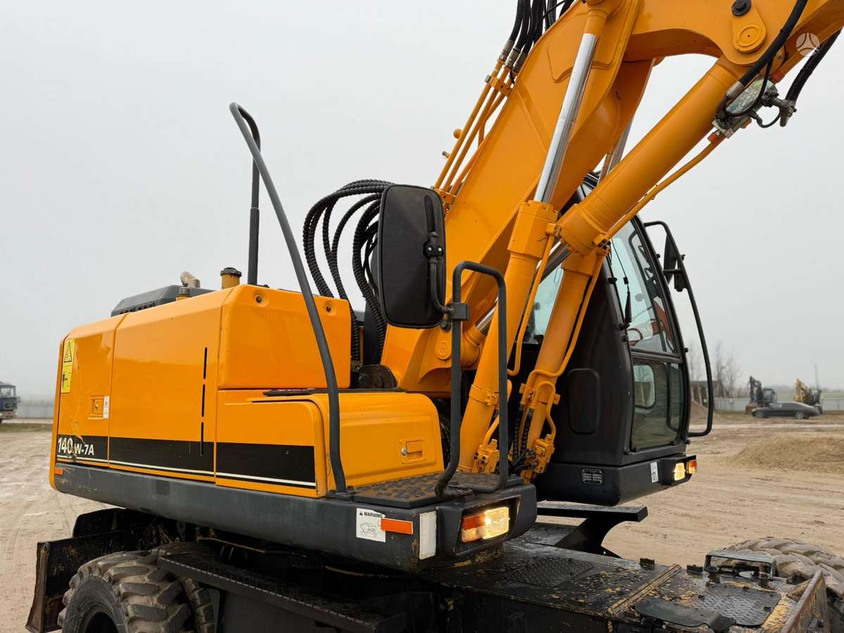 Hyundai Robex 140 W-7A ROTOTILT, экскаваторы