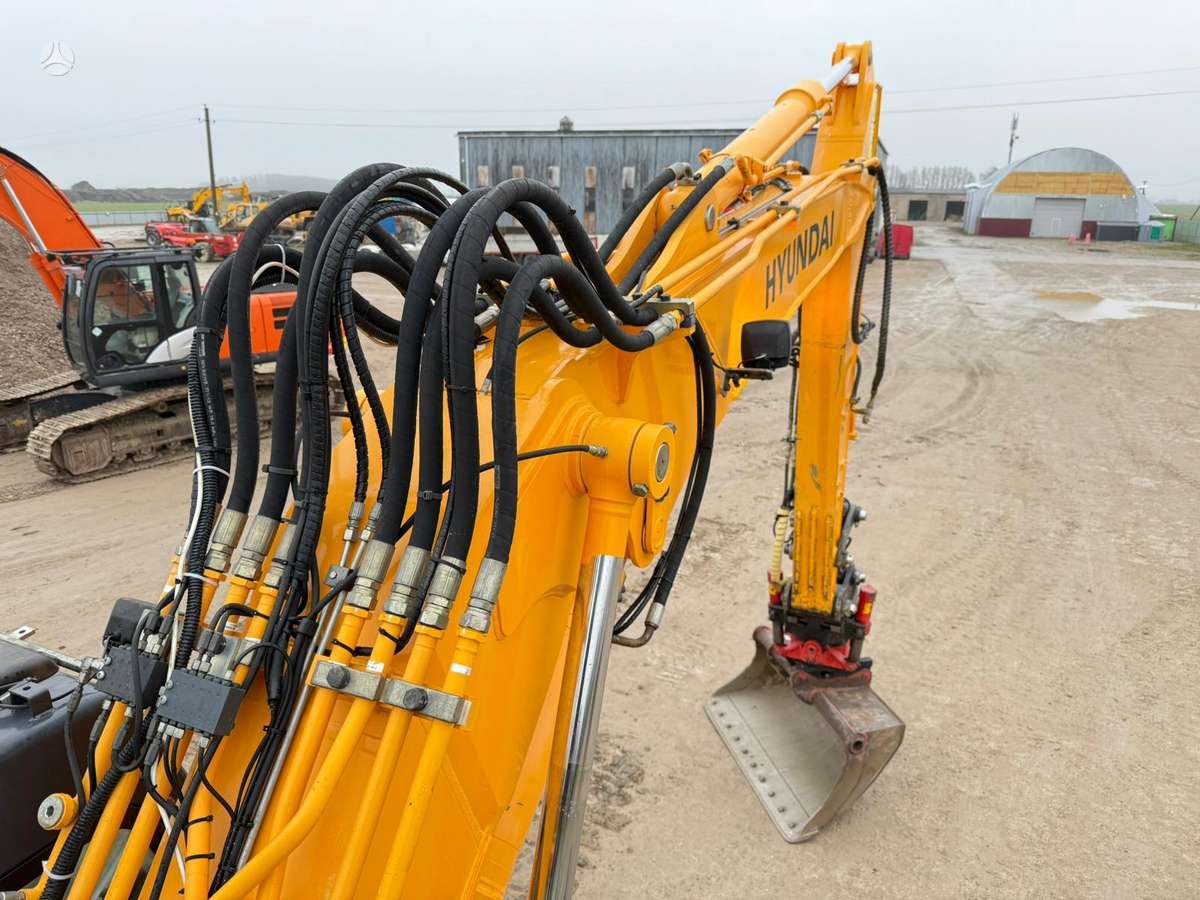 Hyundai Robex 140 W-7A ROTOTILT, экскаваторы