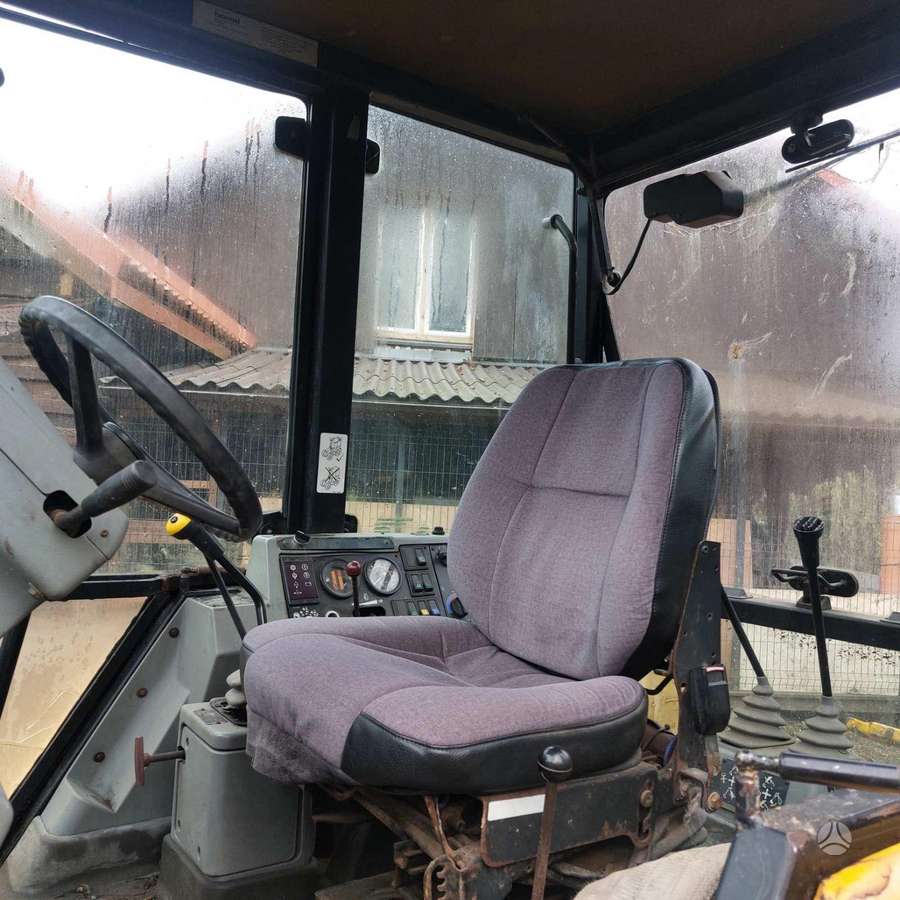 Fermec 860x, excavator loader