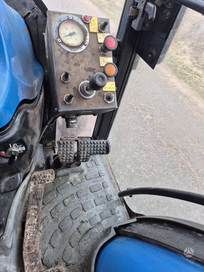 New Holland TC27D, тракторы