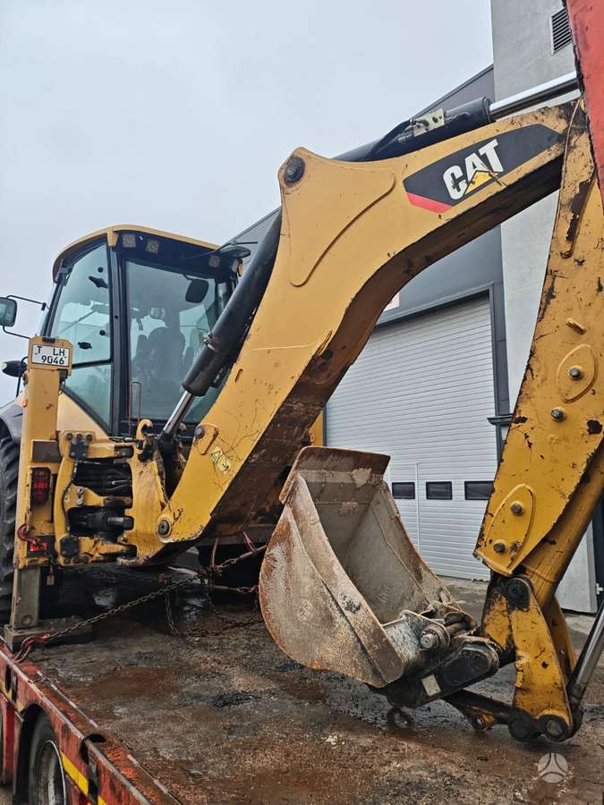 Caterpillar 444F, экскаваторные погрузчики