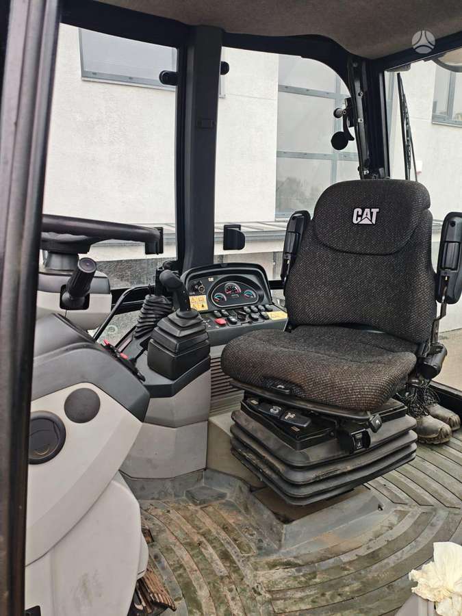 Caterpillar 444F, экскаваторные погрузчики