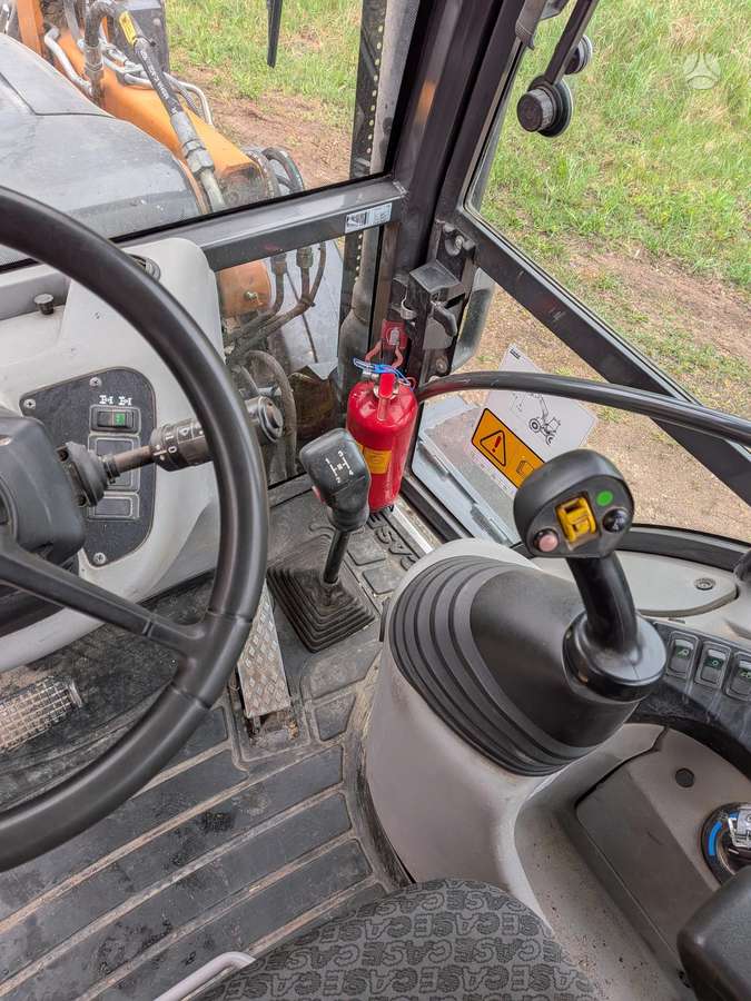 Case 580ST, excavator loader