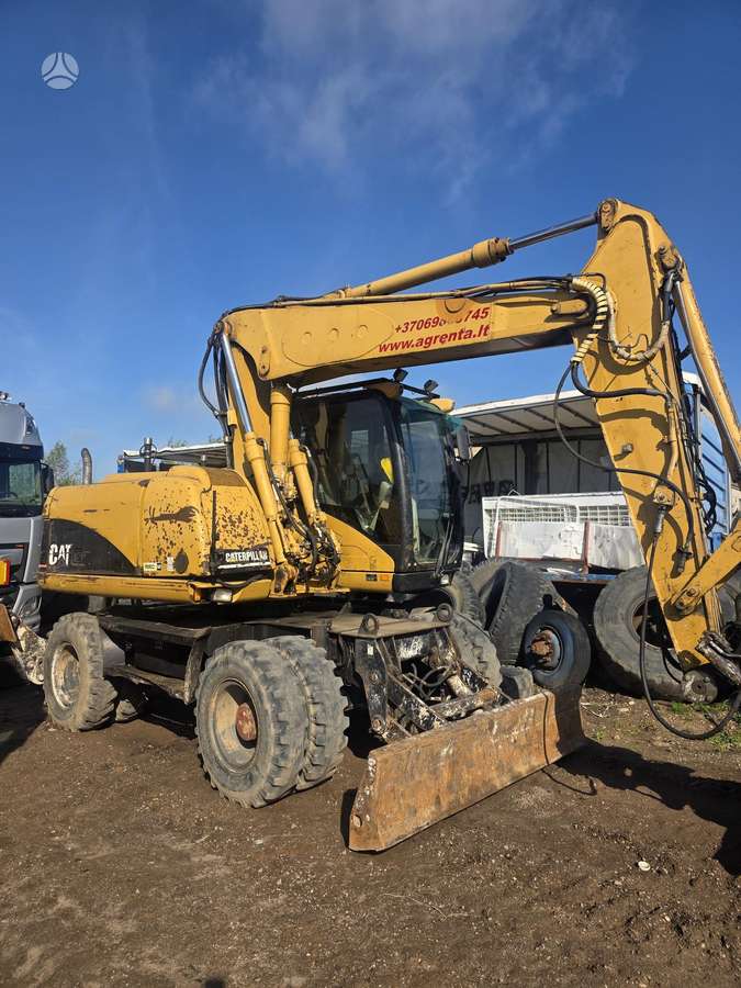 Caterpillar 313C, ekskavatoriai