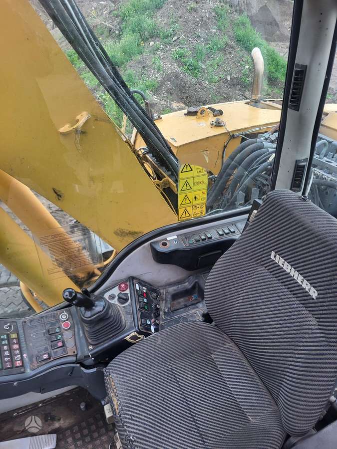 Liebherr 314 Litronic, экскаваторы