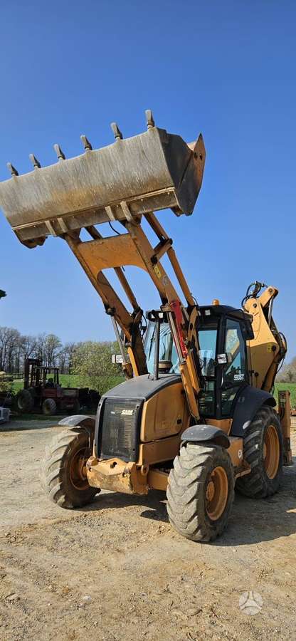 Case 590ST, excavator loader