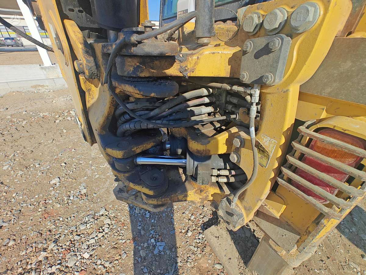 Caterpillar 428, excavator loader