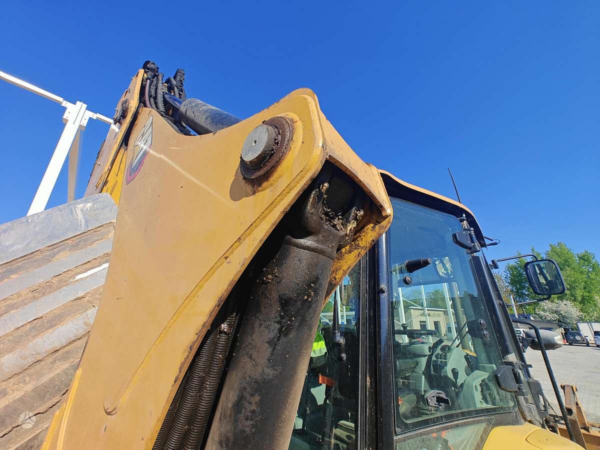 Caterpillar 428, экскаваторные погрузчики