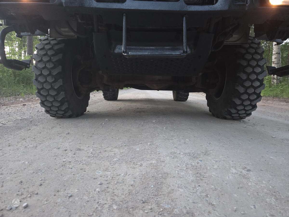 Iveco ML100E18, bortiniai su tentu