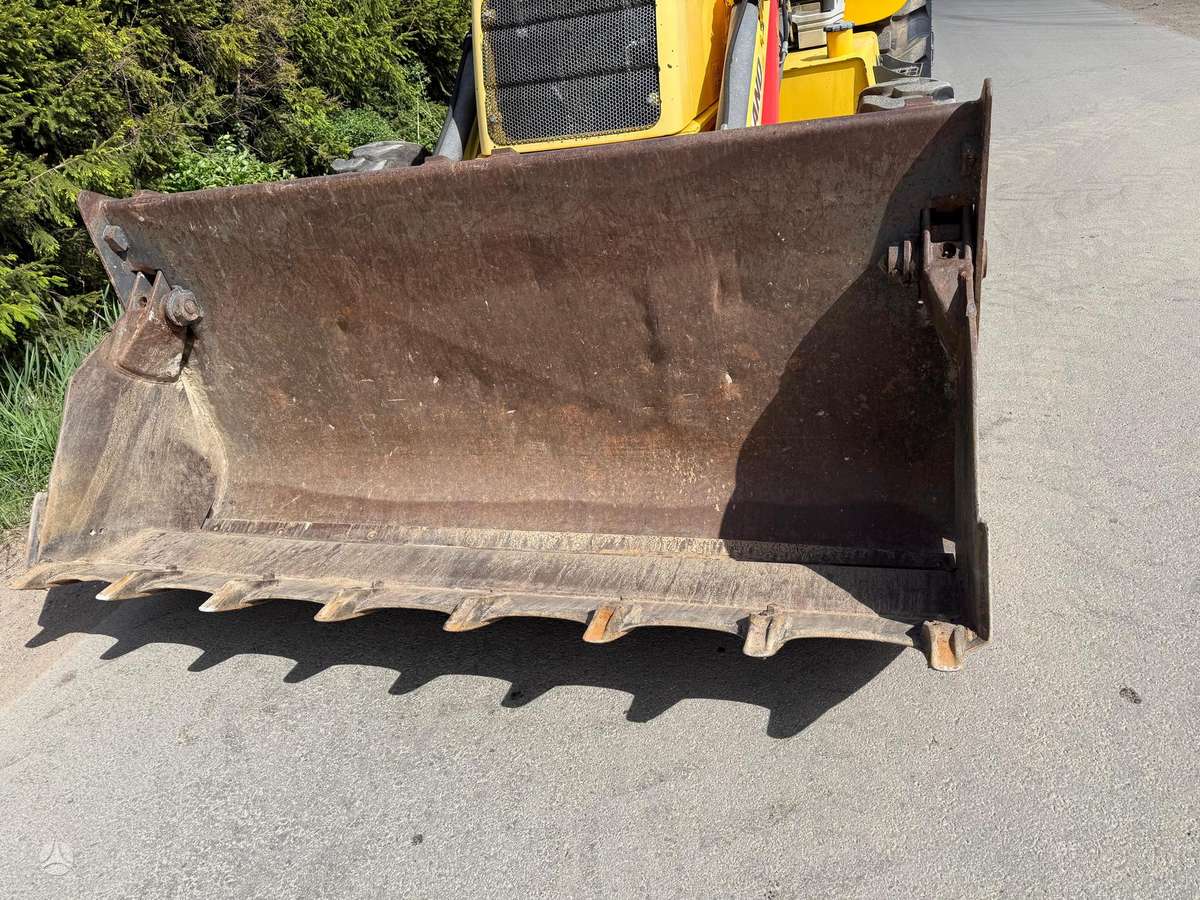 New Holland LB110B-4PT, excavator loader
