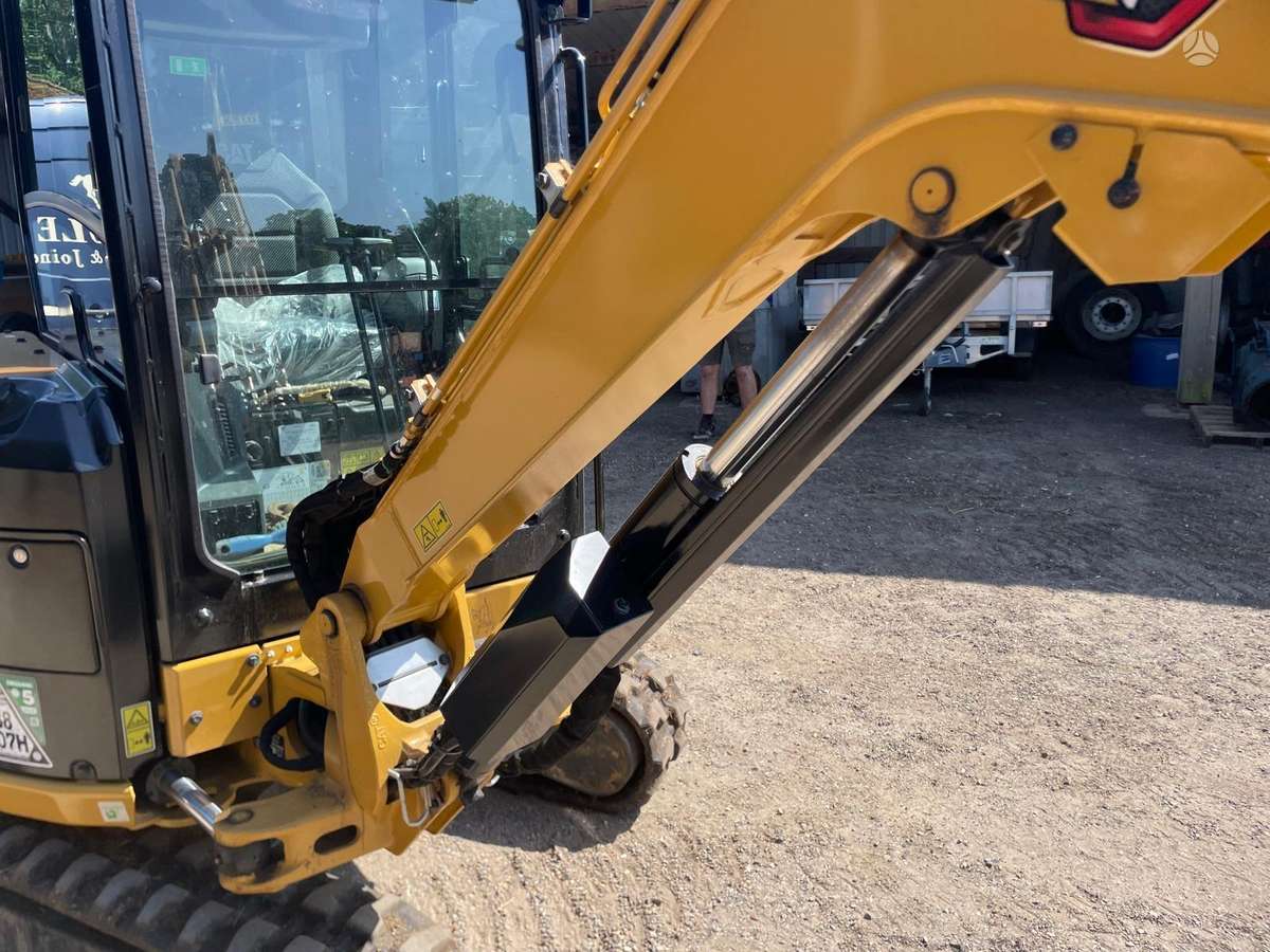 Caterpillar 302.7, мини-экскаваторы