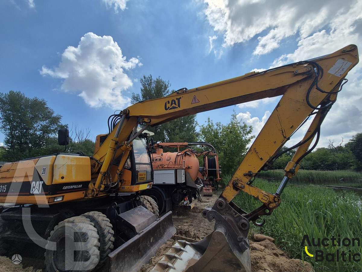 Caterpillar M 315, экскаваторы