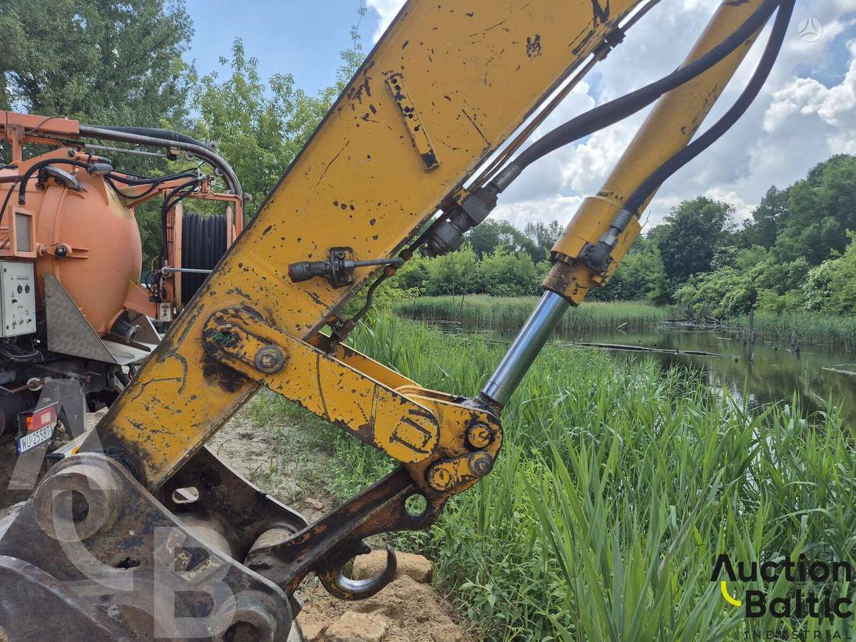 Caterpillar M 315, экскаваторы