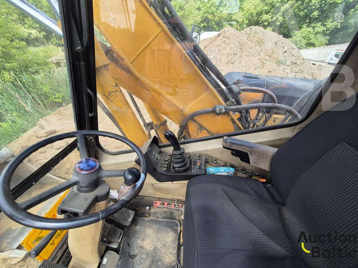 Caterpillar M 315, экскаваторы
