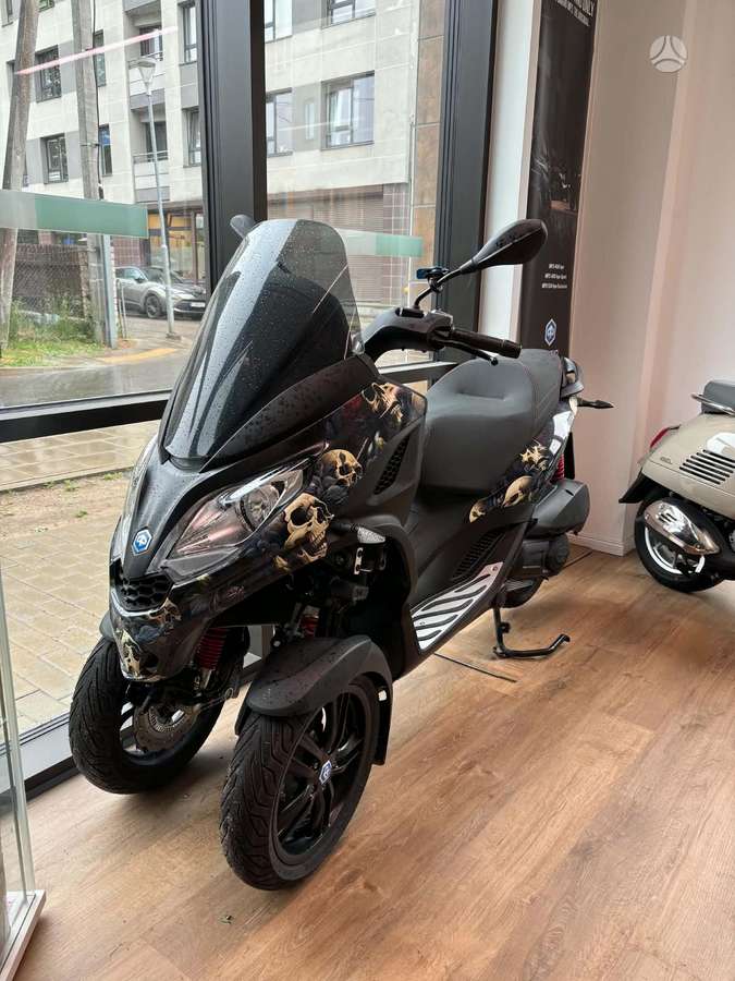 Piaggio MP3 310cc, tricikli