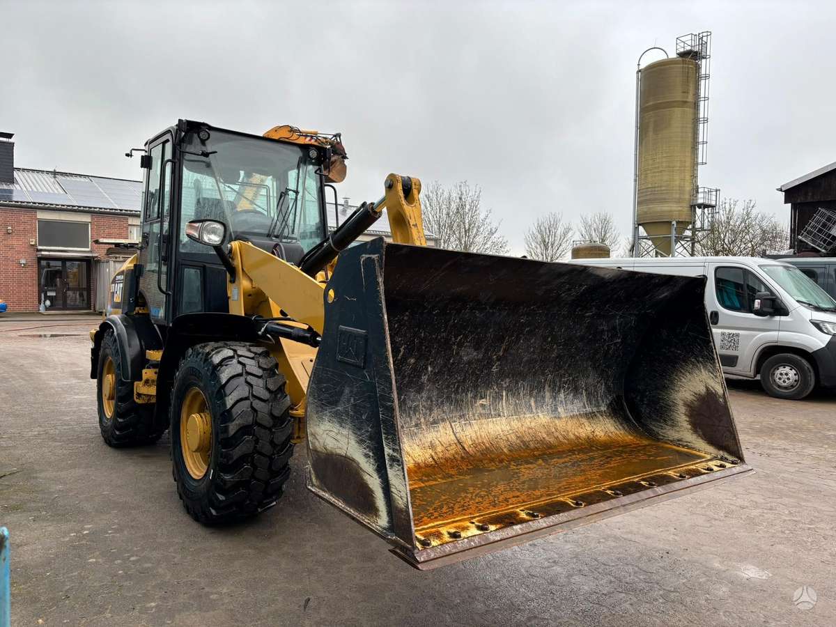 Caterpillar 907M, фронтальные погрузчики