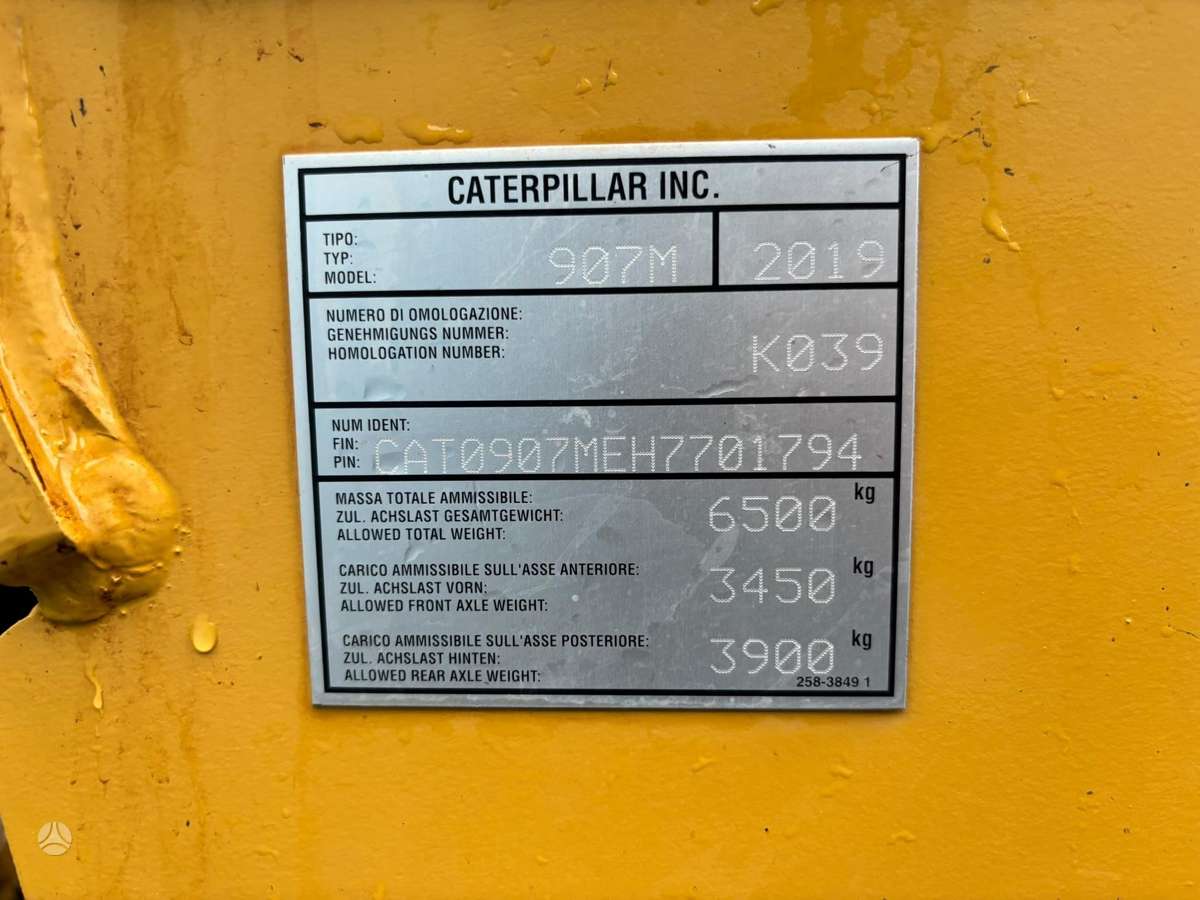 Caterpillar 907M, frontal loader