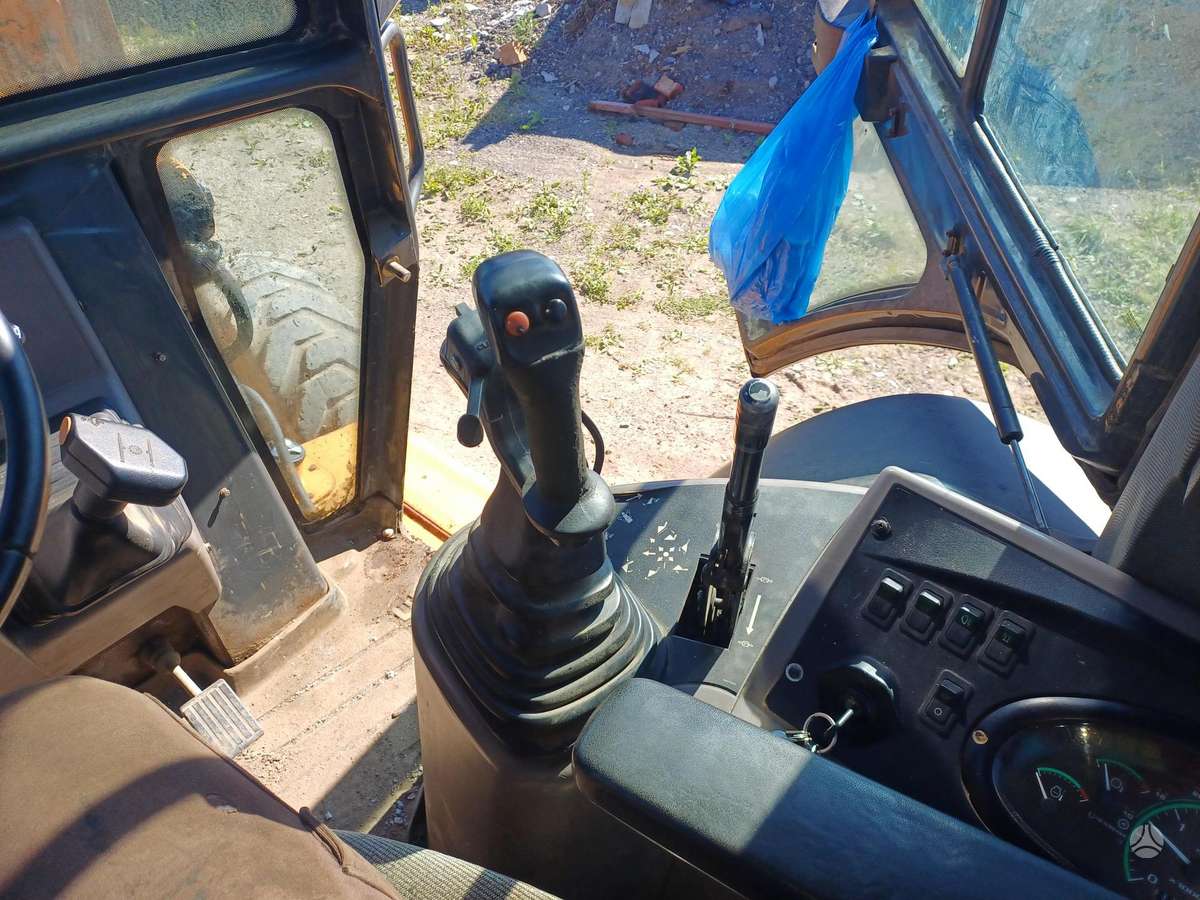Case 580, excavator loader